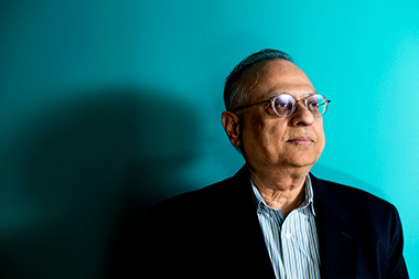 Arun Bansil headshot of him looking off into the distance to the right of the camera