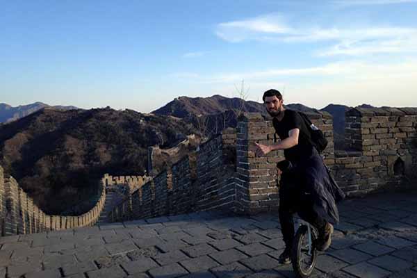 student at the Great Wall of China