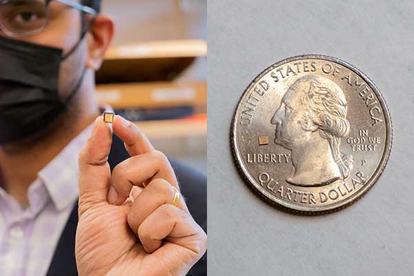 Aatmesh holds a tiny chip about the size of the lettering on a quarter.